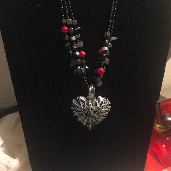 Jewelry - 3 photos of this black, white ,and red glass heart